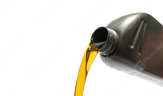 Pouring oil lubricant motor car from silver bottle on isolated white background  : Stock Photo or Stock Video Download rcfotostock photos, images and assets rcfotostock | RC Photo Stock.: