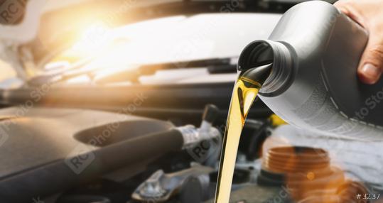 Pouring oil to car engine, close up  : Stock Photo or Stock Video Download rcfotostock photos, images and assets rcfotostock | RC Photo Stock.: