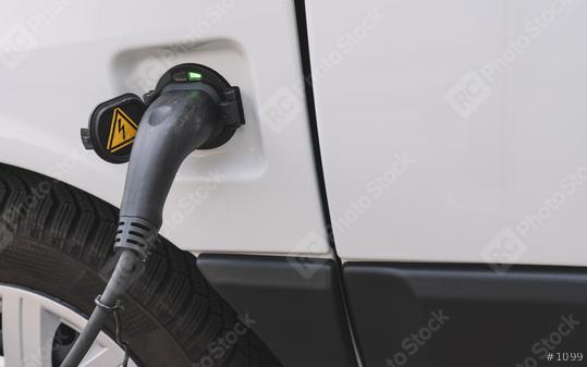 Power supply for electric car is full loaded. Electric car charging station. Close up of the power supply plugged into an electric car being charged.  : Stock Photo or Stock Video Download rcfotostock photos, images and assets rcfotostock | RC Photo Stock.: