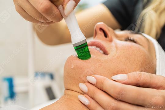 Professional female cosmetologist doing aquafacial procedure in Cosmetology clinic.  : Stock Photo or Stock Video Download rcfotostock photos, images and assets rcfotostock | RC Photo Stock.: