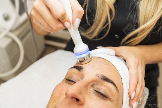 Professional female cosmetologist doing hydrafacial procedure in Cosmetology clinic.  : Stock Photo or Stock Video Download rcfotostock photos, images and assets rcfotostock | RC Photo Stock.: