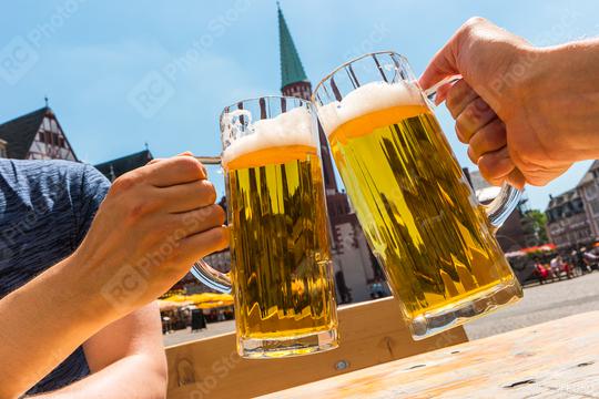 Prost! with two beer glasses at summer in Frankfurt  : Stock Photo or Stock Video Download rcfotostock photos, images and assets rcfotostock | RC Photo Stock.: