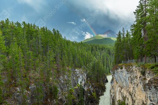 Rainbow at the Sunwapta canyon in the jasper national park canada  : Stock Photo or Stock Video Download rcfotostock photos, images and assets rcfotostock | RC Photo Stock.:
