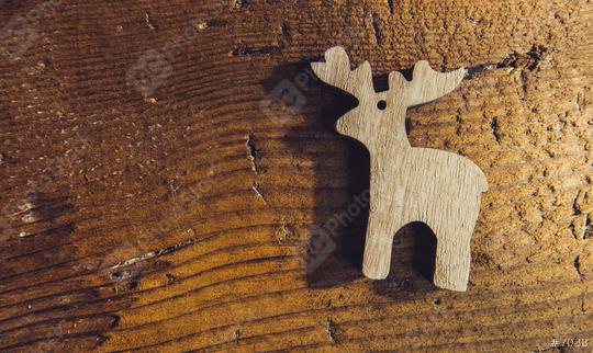 Raindeer ornament symbol on old wood background in greeting card style, including copy space  : Stock Photo or Stock Video Download rcfotostock photos, images and assets rcfotostock | RC Photo Stock.:
