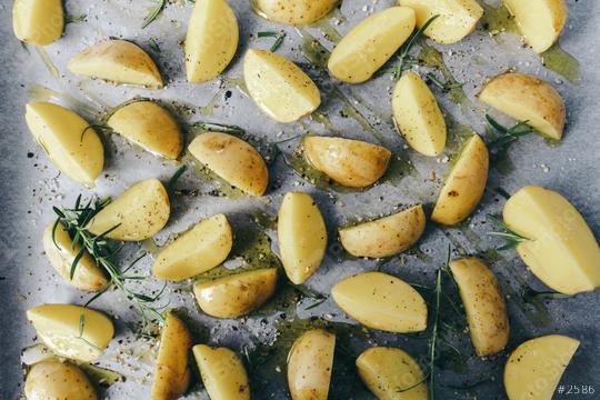 raw potato wedges with oil and pepper on baking tray, food concept background  : Stock Photo or Stock Video Download rcfotostock photos, images and assets rcfotostock | RC Photo Stock.: