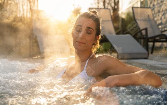 Relaxed woman in a hot tub with steam and sun rays  : Stock Photo or Stock Video Download rcfotostock photos, images and assets rcfotostock | RC Photo Stock.:
