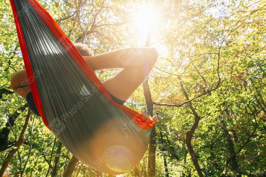 relaxing in the hammock  : Stock Photo or Stock Video Download rcfotostock photos, images and assets rcfotostock | RC Photo Stock.: