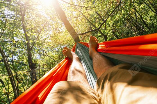 relaxing in the hammock at summer  : Stock Photo or Stock Video Download rcfotostock photos, images and assets rcfotostock | RC Photo Stock.: