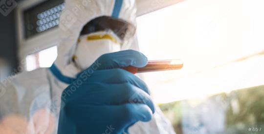 Researcher in protective clothing with test for Covid-19 positive with blood sample and antibody in the laboratory  : Stock Photo or Stock Video Download rcfotostock photos, images and assets rcfotostock | RC Photo Stock.: