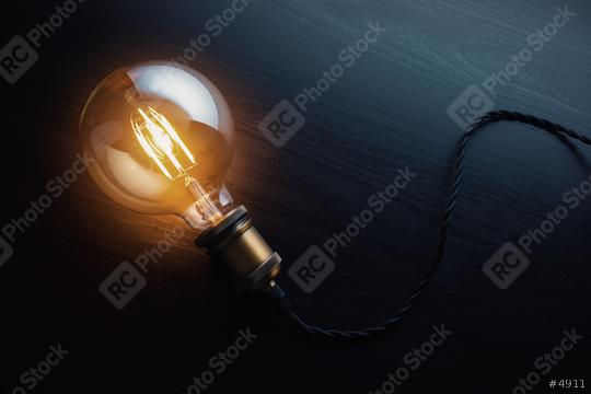 Retro Vintage Edison Bulb on a table  : Stock Photo or Stock Video Download rcfotostock photos, images and assets rcfotostock | RC Photo Stock.: