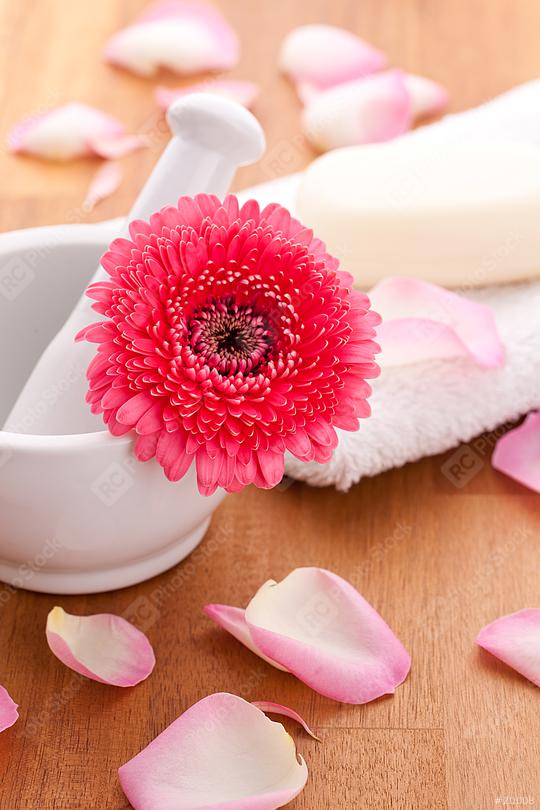 rose leafs on a towel with soap and gebera flower on wooden background  : Stock Photo or Stock Video Download rcfotostock photos, images and assets rcfotostock | RC Photo Stock.:
