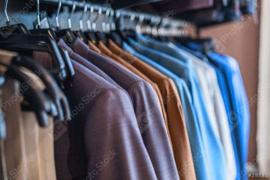 Row of various colored suits on hangers in a clothing store  : Stock Photo or Stock Video Download rcfotostock photos, images and assets rcfotostock | RC Photo Stock.: