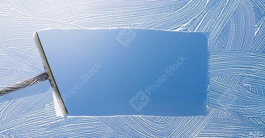 Rubber squeegee cleans a soaped window and clears a stripe of blue sky, concept for tranparency or spring cleaning, with copyspace for your individual text.  : Stock Photo or Stock Video Download rcfotostock photos, images and assets rcfotostock | RC Photo Stock.:
