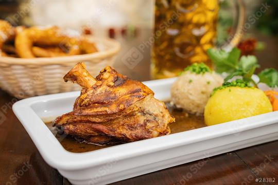 Schweinshaxe, in German cuisine, is a roasted ham hock (or pork knuckle). The ham hock is the end of the pig