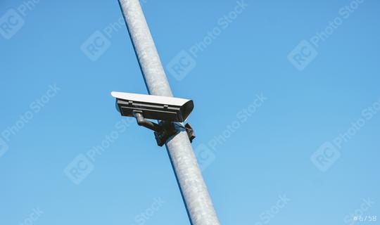 Security camera against blue sky  : Stock Photo or Stock Video Download rcfotostock photos, images and assets rcfotostock | RC Photo Stock.: