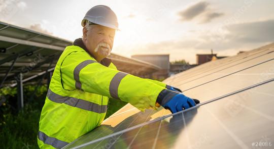 Senior engineer assembling solar panels at an energy farm during sunset. Alternative energy ecological concept image.  : Stock Photo or Stock Video Download rcfotostock photos, images and assets rcfotostock | RC Photo Stock.: