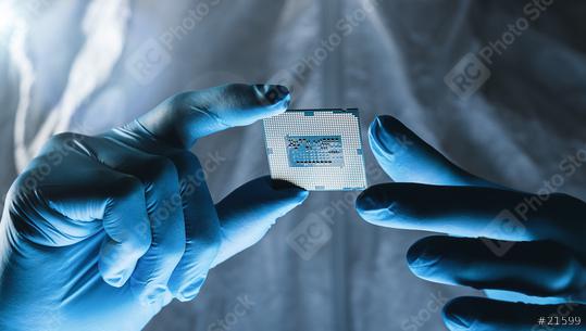 Setting operating modes electronic controllers on a Microchip Engineer hold it for testing microelectronics at a Ultra Modern Electronic Manufacturing Factory  : Stock Photo or Stock Video Download rcfotostock photos, images and assets rcfotostock | RC Photo Stock.: