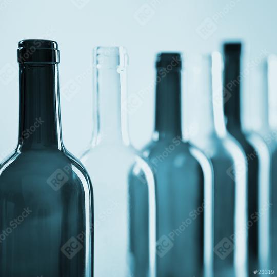 several wine glass bottles in a row in blue color  : Stock Photo or Stock Video Download rcfotostock photos, images and assets rcfotostock | RC Photo Stock.: