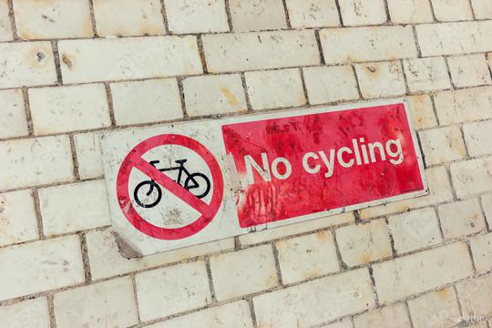 Sign, No Cycling on a dirty brick wall   : Stock Photo or Stock Video Download rcfotostock photos, images and assets rcfotostock | RC Photo Stock.:
