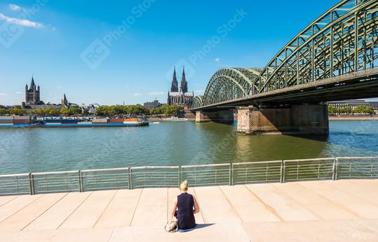 single woman pending the time at the deutzer rhine boulevard at a summer day in Cologne  : Stock Photo or Stock Video Download rcfotostock photos, images and assets rcfotostock | RC Photo Stock.: