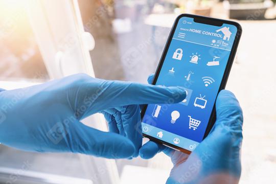 smart home app in coronavirus quarantine to unlock the door of his house. smart home technology interface in a smartphone screen application. Hand holding smart device.   : Stock Photo or Stock Video Download rcfotostock photos, images and assets rcfotostock | RC Photo Stock.: