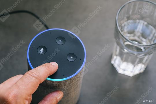 Smart speaker and male hand and a glass of water on a table  : Stock Photo or Stock Video Download rcfotostock photos, images and assets rcfotostock | RC Photo Stock.: