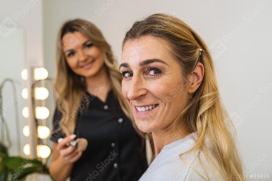 smiling customer and makeup artist with brusht in beauty salon  : Stock Photo or Stock Video Download rcfotostock photos, images and assets rcfotostock | RC Photo Stock.: