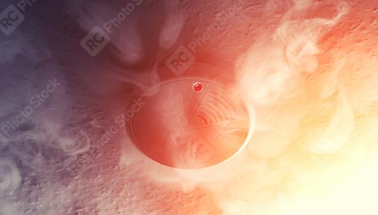 Smoke detector in the smoke of a fire  : Stock Photo or Stock Video Download rcfotostock photos, images and assets rcfotostock | RC-Photo-Stock.: