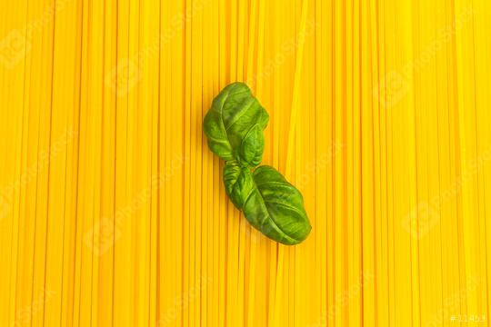 spaghetti noodles background with basil leaf  : Stock Photo or Stock Video Download rcfotostock photos, images and assets rcfotostock | RC Photo Stock.: