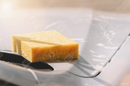sponge over the car for washing  : Stock Photo or Stock Video Download rcfotostock photos, images and assets rcfotostock | RC Photo Stock.: