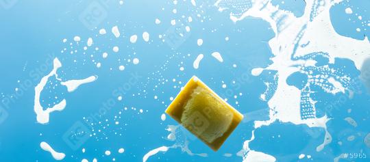 sponge with soap on a glass window  : Stock Photo or Stock Video Download rcfotostock photos, images and assets rcfotostock | RC Photo Stock.: