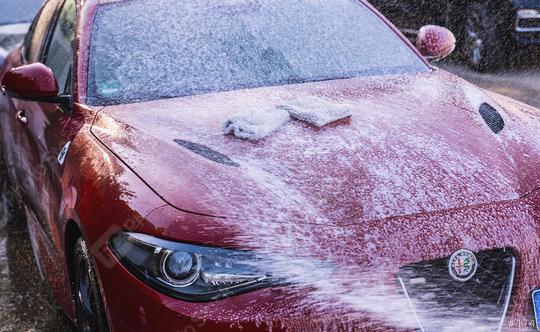 sponges on a red car ready for car wash  : Stock Photo or Stock Video Download rcfotostock photos, images and assets rcfotostock | RC Photo Stock.: