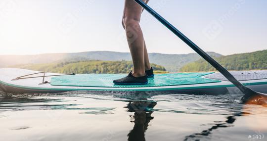 Standup paddler at the lake at summer  : Stock Photo or Stock Video Download rcfotostock photos, images and assets rcfotostock | RC Photo Stock.: