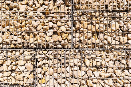 Stone wall in metallic net   : Stock Photo or Stock Video Download rcfotostock photos, images and assets rcfotostock | RC Photo Stock.: