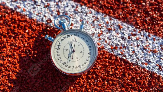 Stopwatch on red running track, white lane marker, time measurement, athletic equipment, sunny  : Stock Photo or Stock Video Download rcfotostock photos, images and assets rcfotostock | RC Photo Stock.: