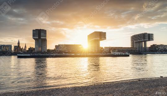 Sunset at the rhine shore in cologne at with crane houses  : Stock Photo or Stock Video Download rcfotostock photos, images and assets rcfotostock | RC Photo Stock.: