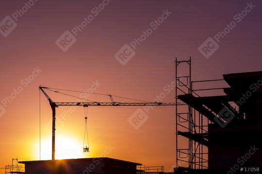 sunset sun dawn at Construction site building crane technology  : Stock Photo or Stock Video Download rcfotostock photos, images and assets rcfotostock | RC Photo Stock.: