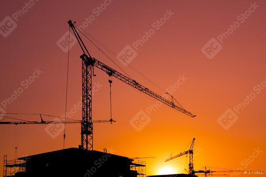 sunset sun dawn at Construction site building crane technology  : Stock Photo or Stock Video Download rcfotostock photos, images and assets rcfotostock | RC Photo Stock.: