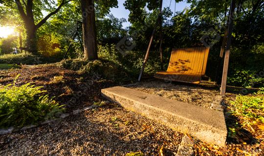 swing bench in a garden at sunrise, sunlight filtering through trees  : Stock Photo or Stock Video Download rcfotostock photos, images and assets rcfotostock | RC Photo Stock.: