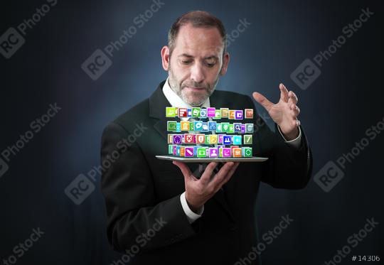 Tablet PC with cloud of application icons  : Stock Photo or Stock Video Download rcfotostock photos, images and assets rcfotostock | RC Photo Stock.: