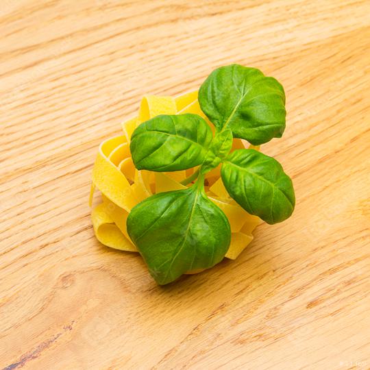 tagliatelle pasta nest with basil leaf  : Stock Photo or Stock Video Download rcfotostock photos, images and assets rcfotostock | RC Photo Stock.:
