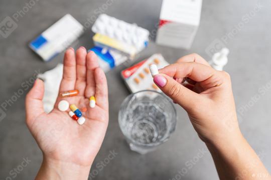 taking medikaments pills for medication  : Stock Photo or Stock Video Download rcfotostock photos, images and assets rcfotostock | RC Photo Stock.: