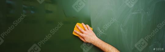 Teacher Hand cleaning dirty green chalkboard with sponge, blackboard texture background with copy space, banner size  : Stock Photo or Stock Video Download rcfotostock photos, images and assets rcfotostock | RC Photo Stock.: