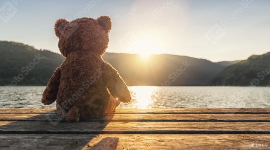 teddy bear sitting on a jetty at a lake on sunset, rear view. Love theme. Concept about love and relationship. copyspace for your individual text.  : Stock Photo or Stock Video Download rcfotostock photos, images and assets rcfotostock | RC Photo Stock.: