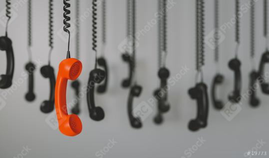 telephone receivers hanging over gray background concept for on the phone, on hold or contact us  : Stock Photo or Stock Video Download rcfotostock photos, images and assets rcfotostock | RC Photo Stock.: