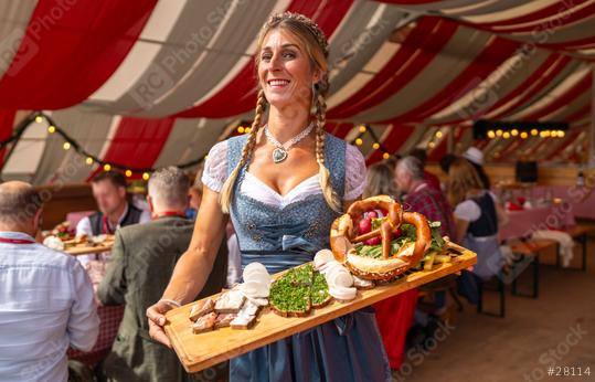 tent, tourism, fresh food presentation, oktoberfest, public event, carnival, braided hair, wooden tray, sliced bread, onions, radishes, cheeses, service, hospitality, european culture, serving food, g  : Stock Photo or Stock Video Download rcfotostock photos, images and assets rcfotostock | RC Photo Stock.: