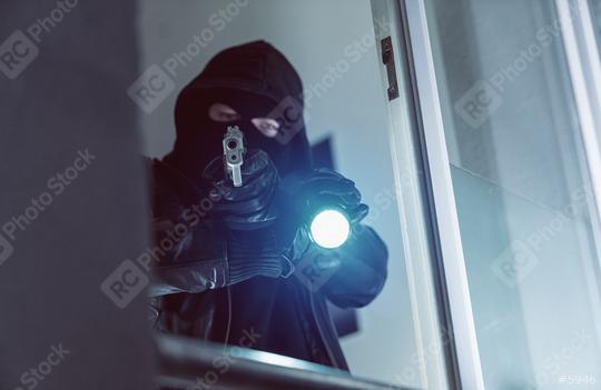 Terrorist or a Burglar pointing with a gun outside a window at night  : Stock Photo or Stock Video Download rcfotostock photos, images and assets rcfotostock | RC Photo Stock.: