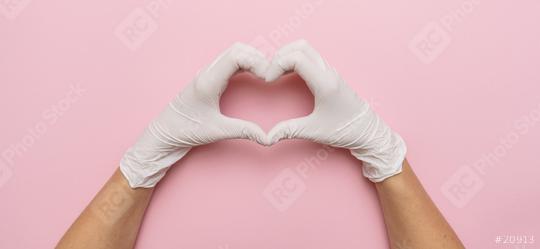 Thanks you doctors  for tje Corona Vaccination in the pandemic, horizontal banner with copy space for text. Female hands in white gloves show symbol of heart shape on pink background.   : Stock Photo or Stock Video Download rcfotostock photos, images and assets rcfotostock | RC Photo Stock.: