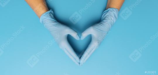 Thanks you doctors in the Corona pandemic, horizontal banner with copy space for text. Female hands in blue gloves show symbol of heart shape on blue background.  : Stock Photo or Stock Video Download rcfotostock photos, images and assets rcfotostock | RC Photo Stock.: