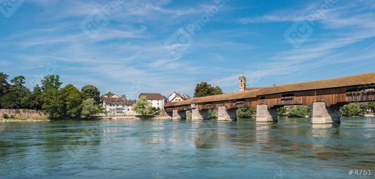 The historic wood border bridge over Rhine river and Fridolins minster in Bad Saeckingen at summer, Black Forest, Baden-Wurttemberg, Germany, Europe  : Stock Photo or Stock Video Download rcfotostock photos, images and assets rcfotostock | RC Photo Stock.: